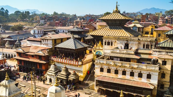 Visit Pashupatinath Stupa, a religious site dedicated to lord Shiva, while spending 10 days in Nepal.