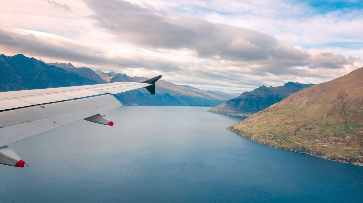 Book a flight to New Zealand for your holiday.