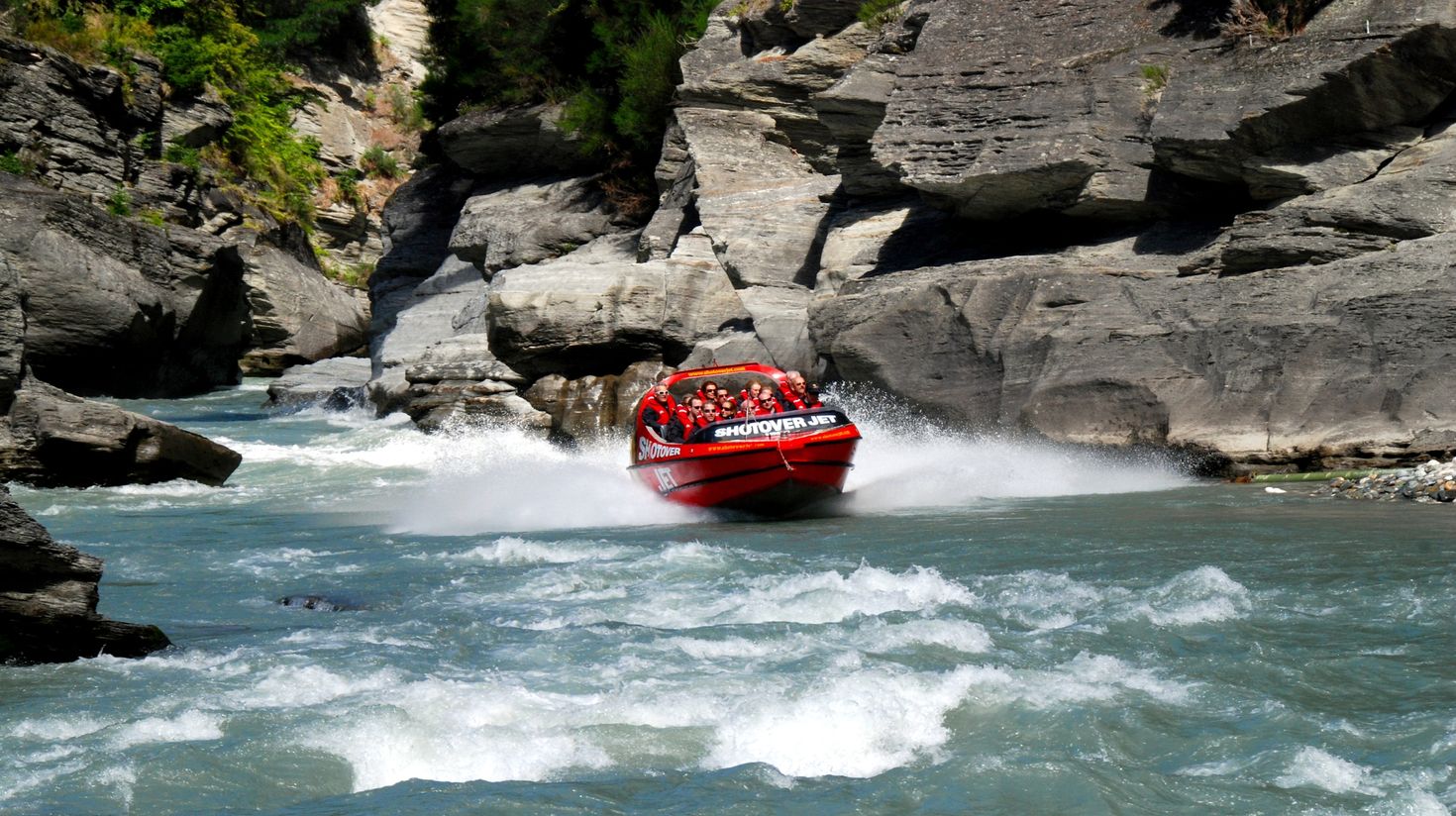 Go jet boating in New Zealand in Queenstown.