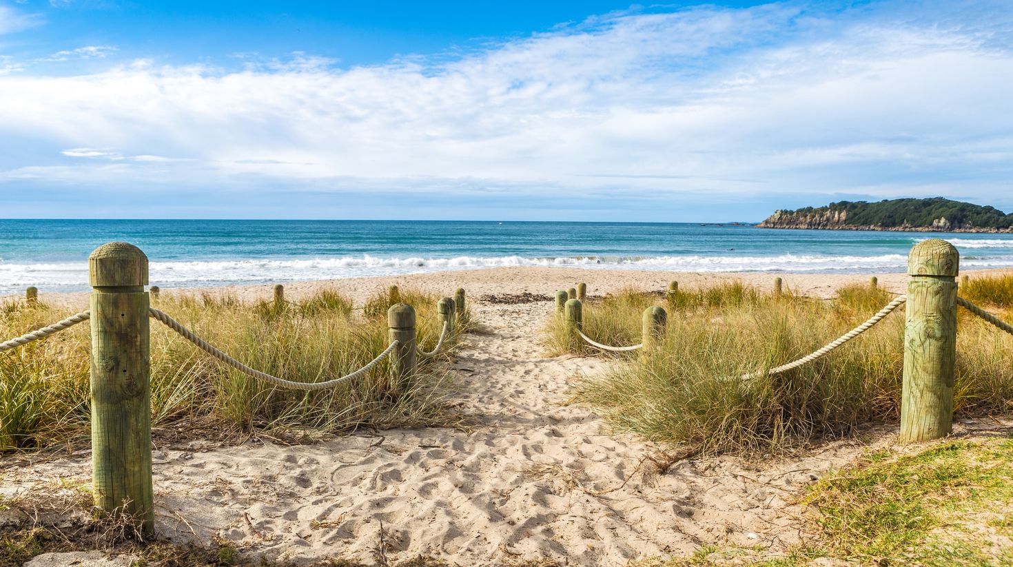 Head to the beaches in New Zealand for some warmth under the sun.