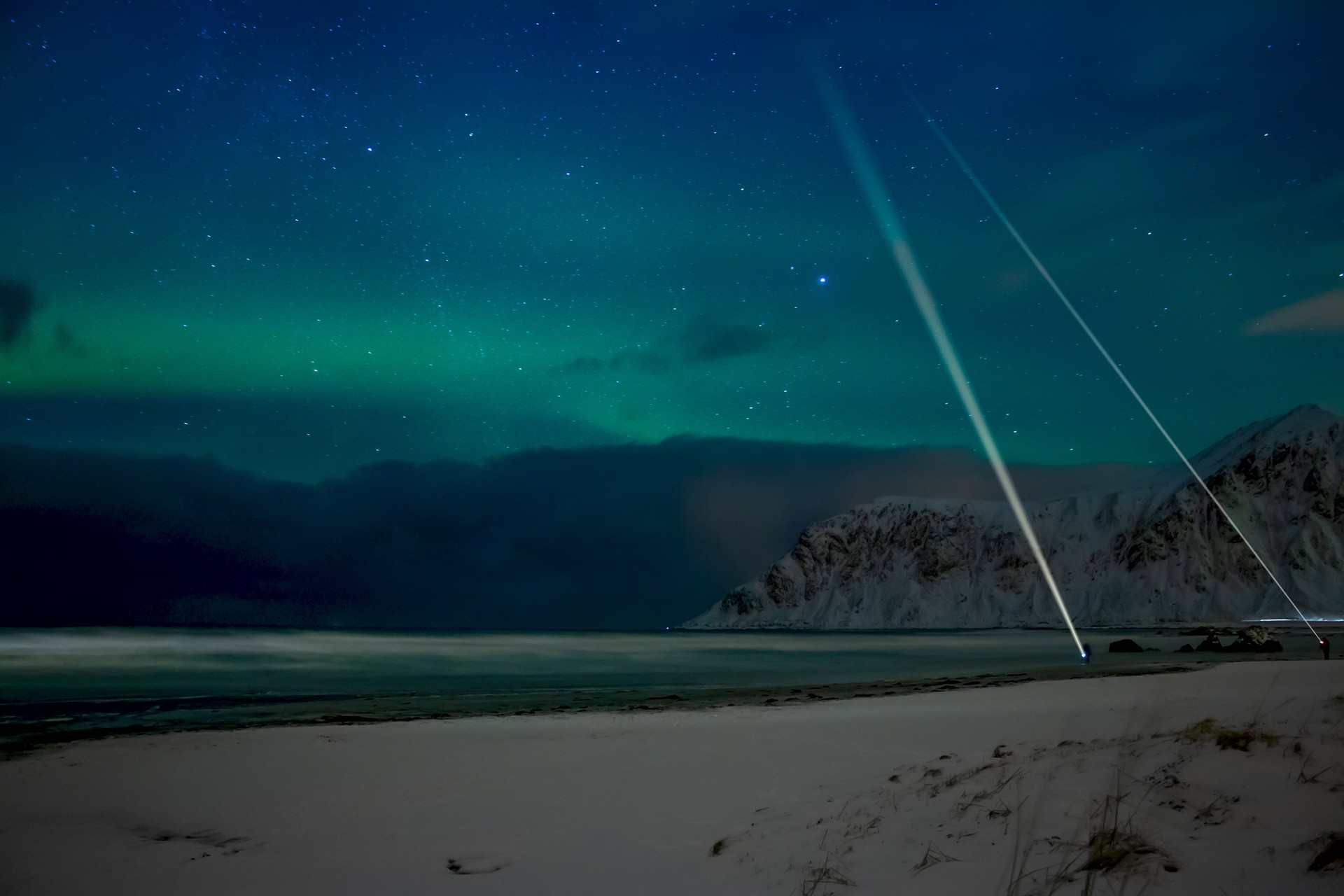 Witness the breathtaking Northern Lights in Norway in February, offering a magical display of nature’s beauty in the heart of winter. Northern Lights in Lofoten Island in Norway in February.