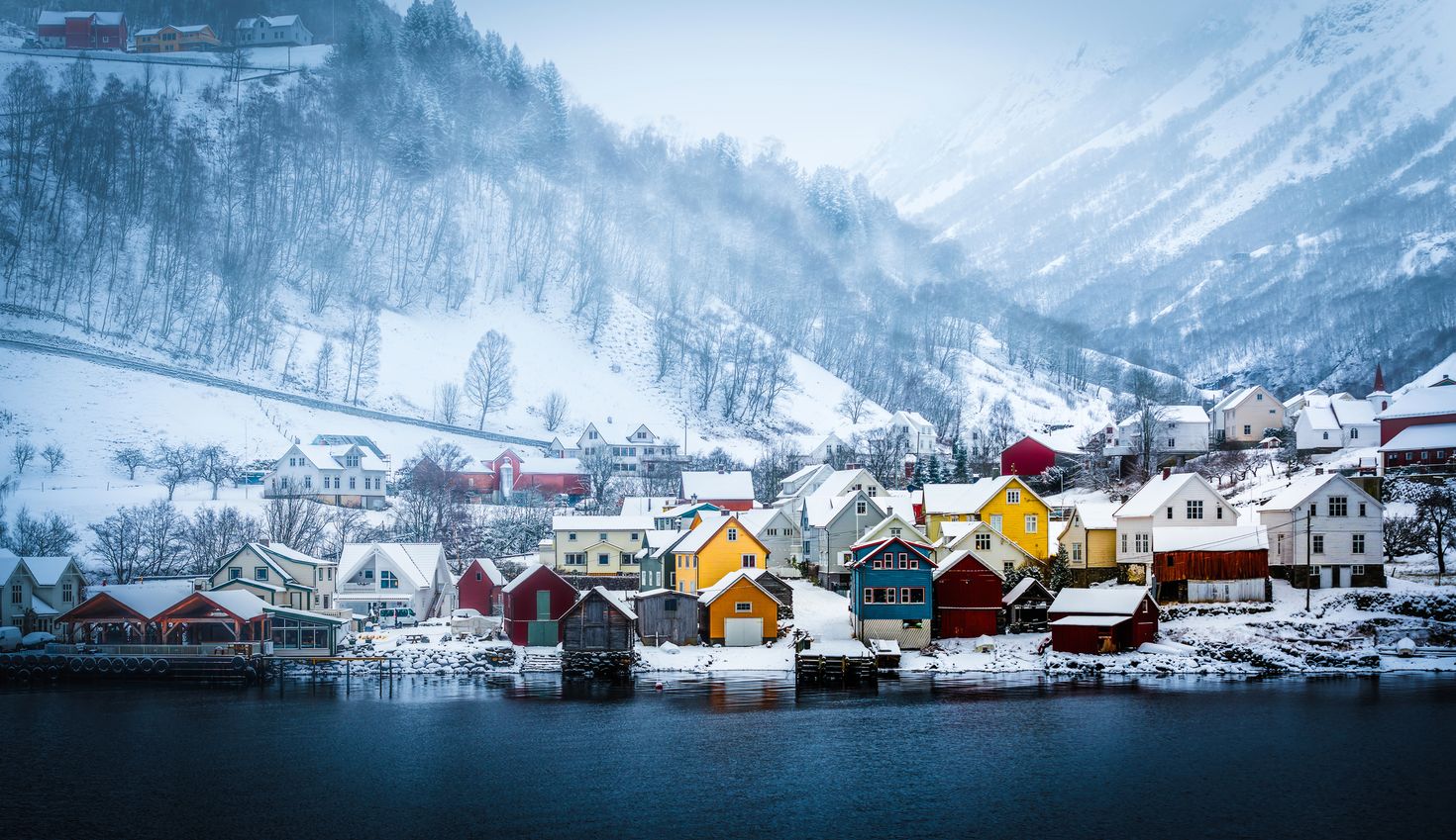 Wooden houses on the banks of the Norwegian fjord in Bergen, Norway