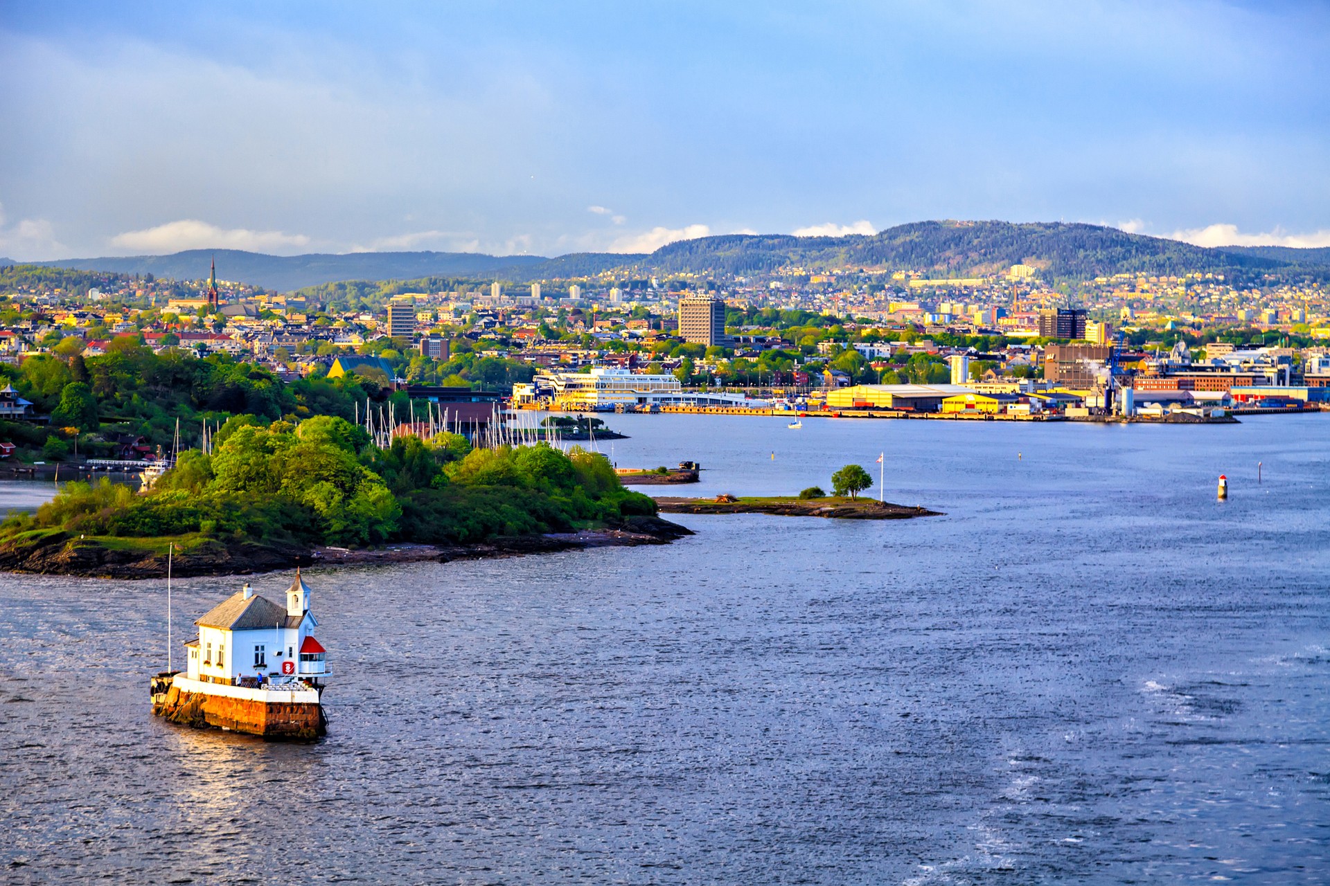 Experience the stunning beauty of Oslo, where winter’s charm meets the promise of spring during your visit to Norway in March. Aerial view of modern district Oslo of Norway in March.
