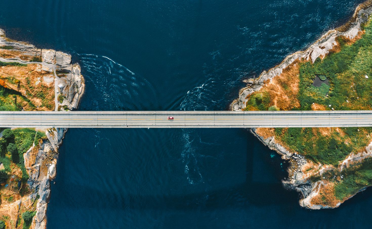 Aerial view Saltstraumen bridge in Norway road above sea connecting islands