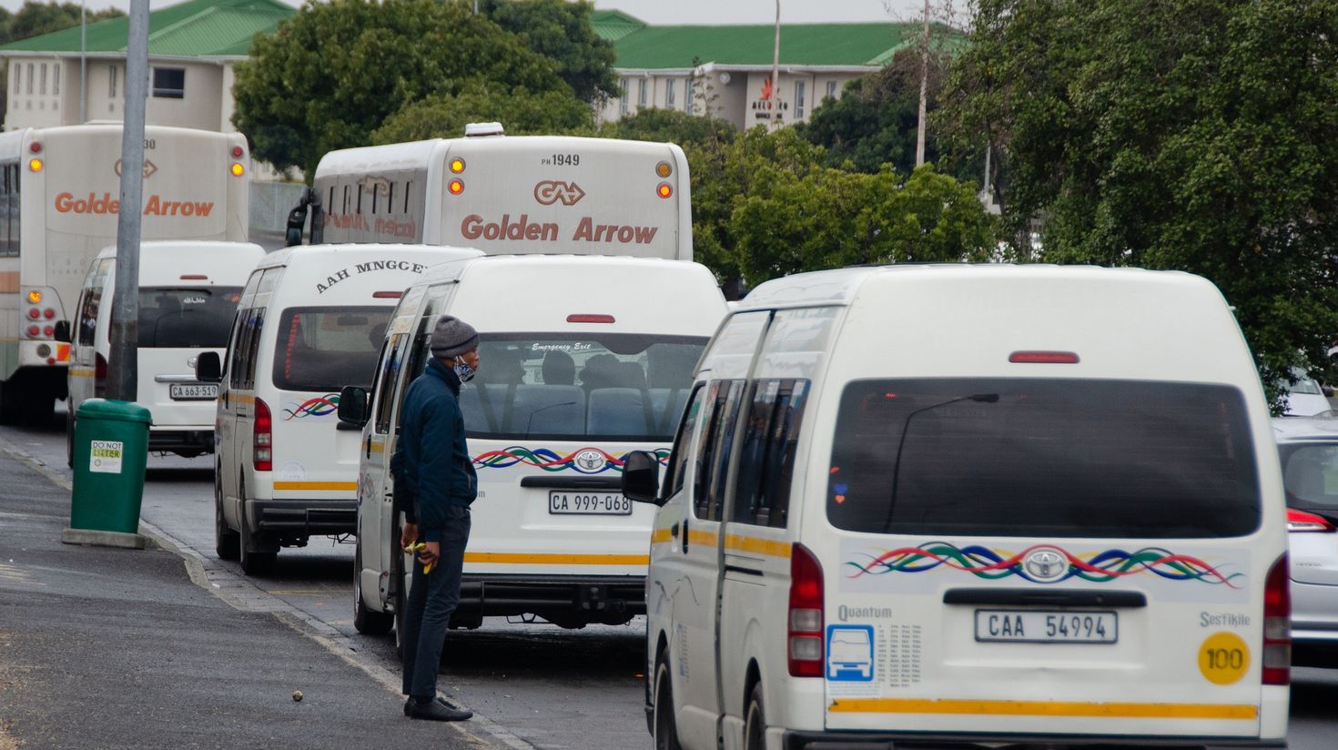 A man gets into public transport in South Africa.