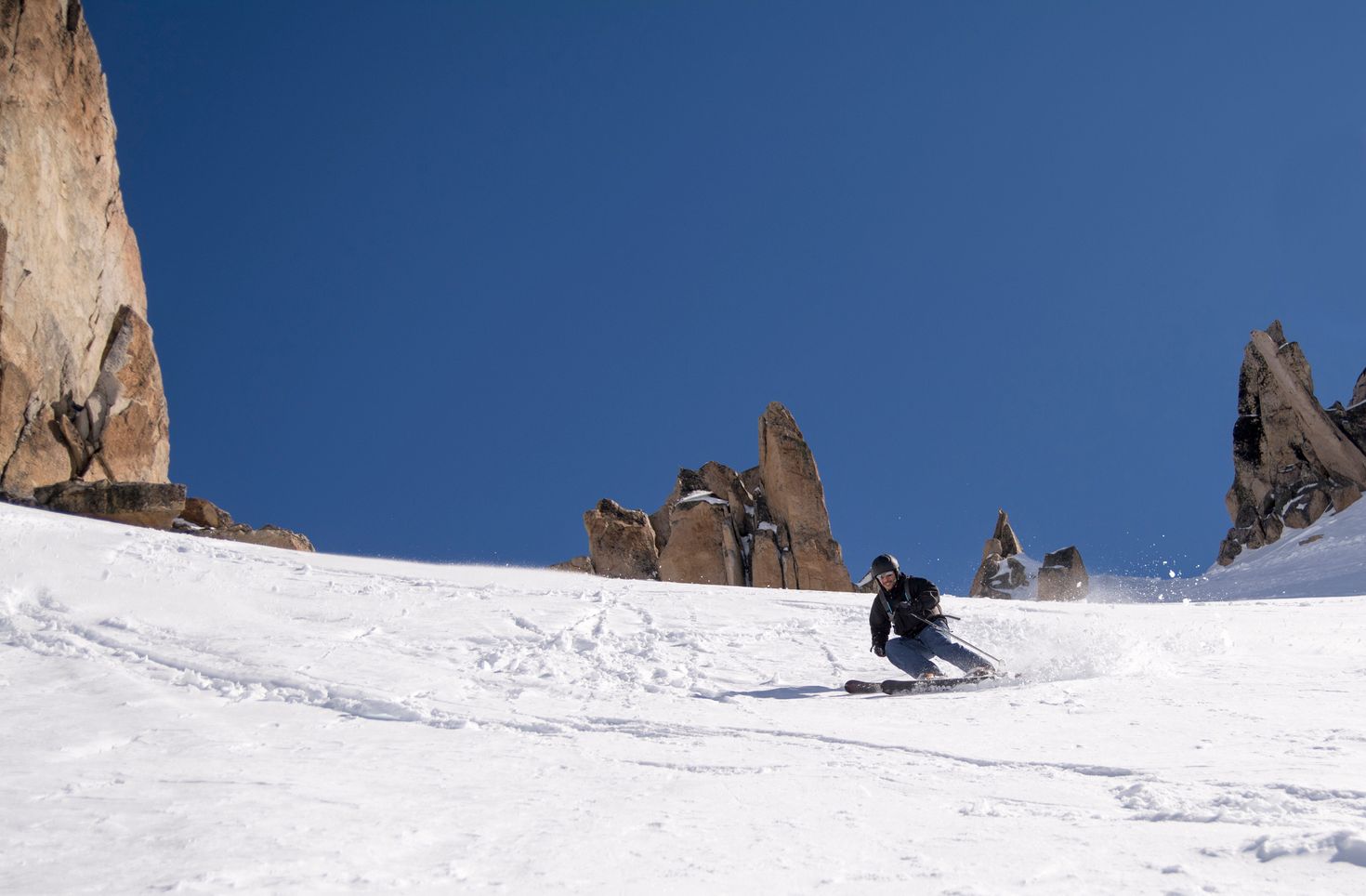 A man enjoying skiing in Patagonia during August.