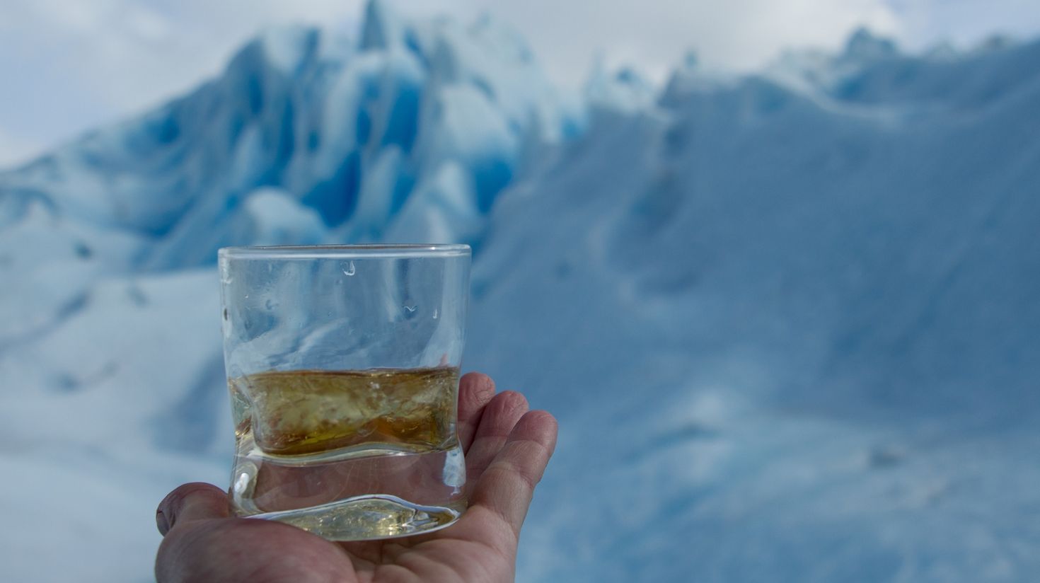 A glass of whiskey at Perito Moreno