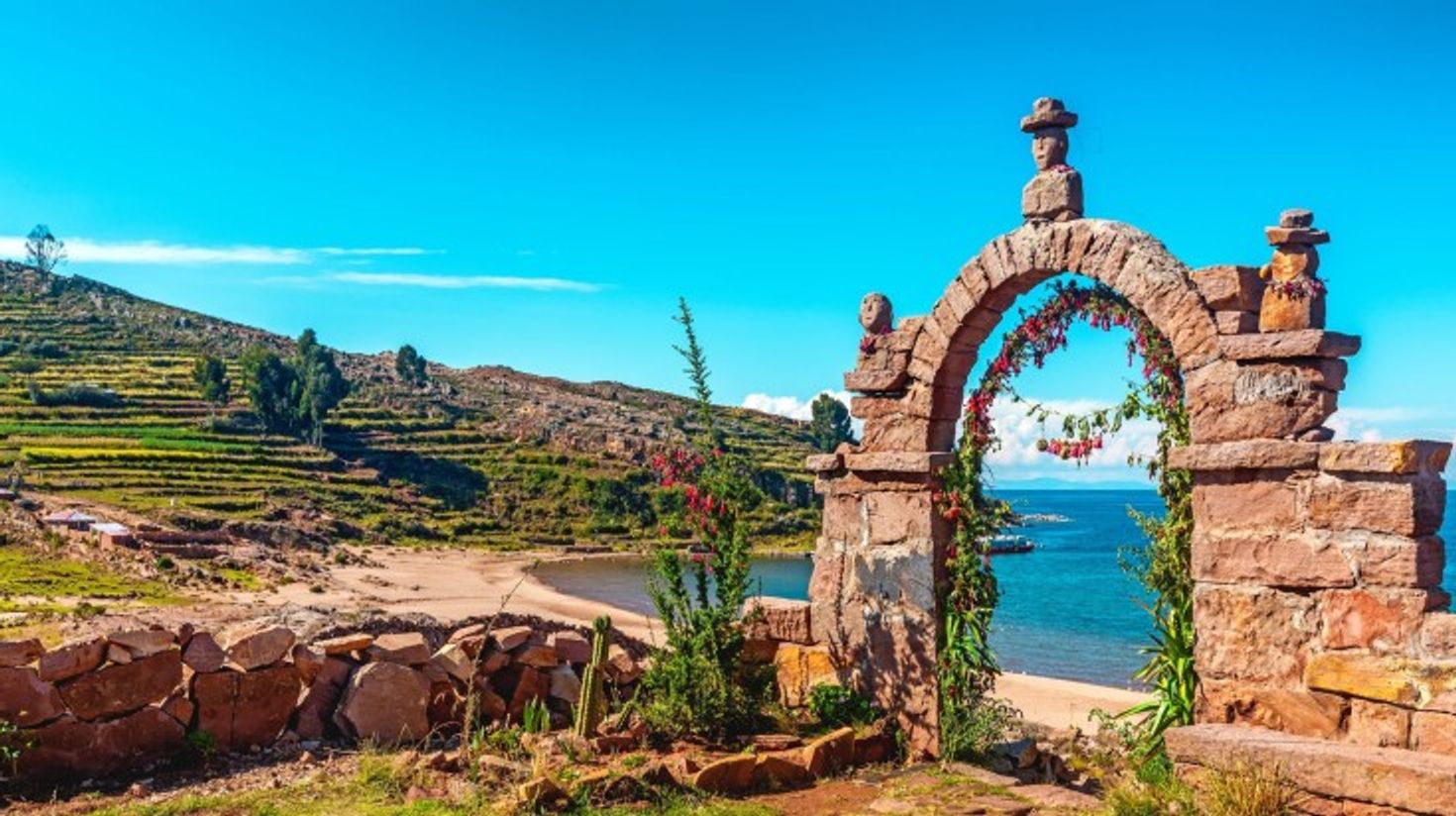 Entrance stone arch leading to the interior of Taquile Island in Lake Titic