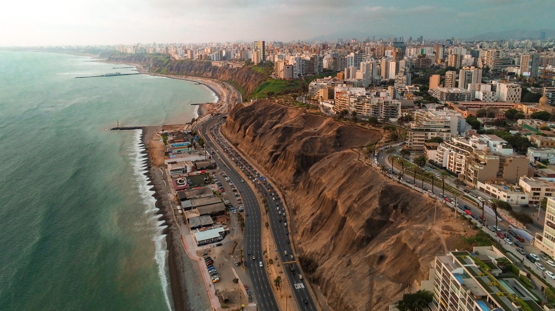Visit Barranco, Lima's bohemian district; roam amid the bring buildings, witness beautiful street art, and go to the best bars in Peru. View of Barranco, Lima, Peru in March