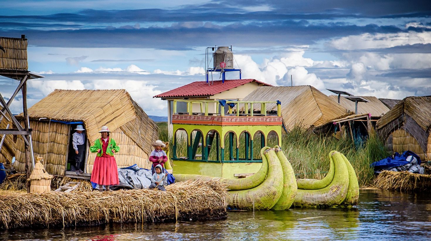 Floating village family Island Titicaca Lake, Puno,