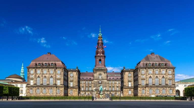 Christiansborg Palace in Copenhagen which is one of the top places to visit in Denmark on a clear day.