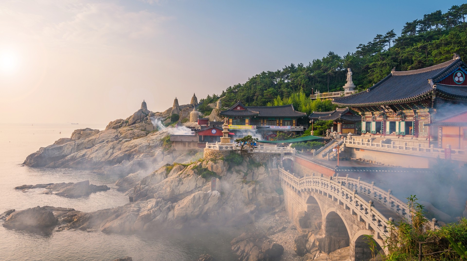 Perched along the coastline of Busan, Haedong Yonggungsa Temple is a seaside temple known for its ocean views, intricate architecture, and the Buddhist traditions. Busan is the best place to visit in South Korea for its architecture.