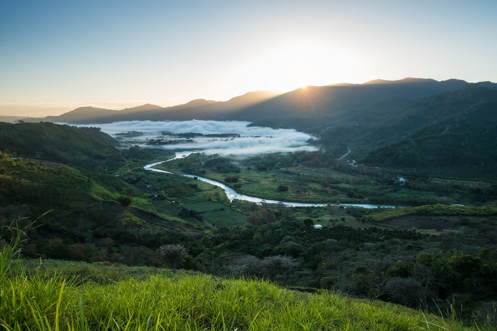 The Orosi Valley is notable for its lush vegetation and incredible scenery that shines during the sunrise in Costa Rica Sunrise at Valley of Orosi, Costa Rica