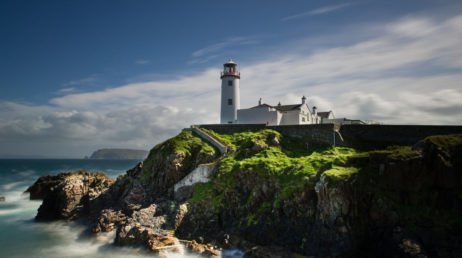 Visit this picturesque lighthouse in Donegal while touring Ireland.