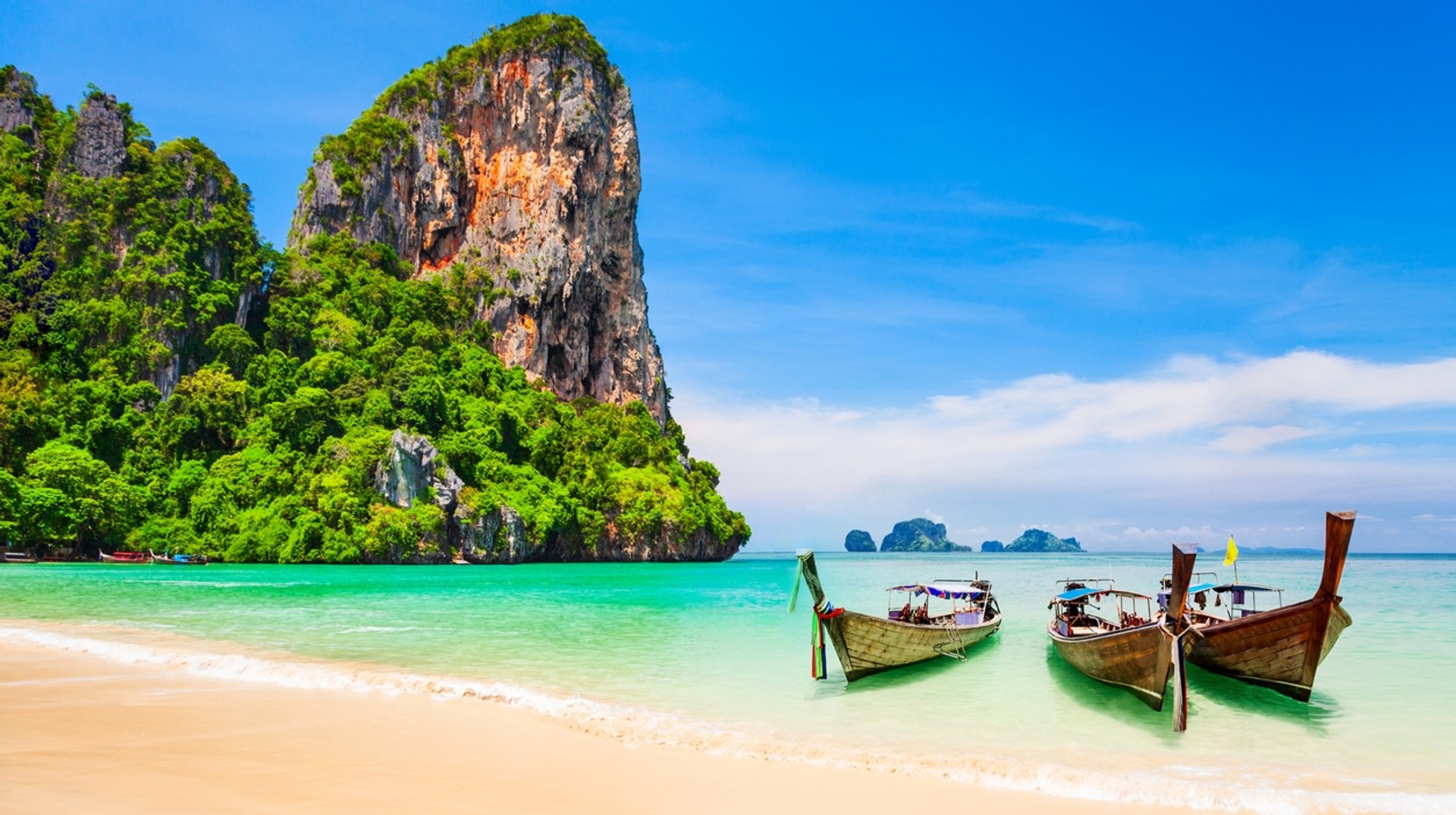 Make sure to enjoy the clear water beach while planning a trip to Thailand.