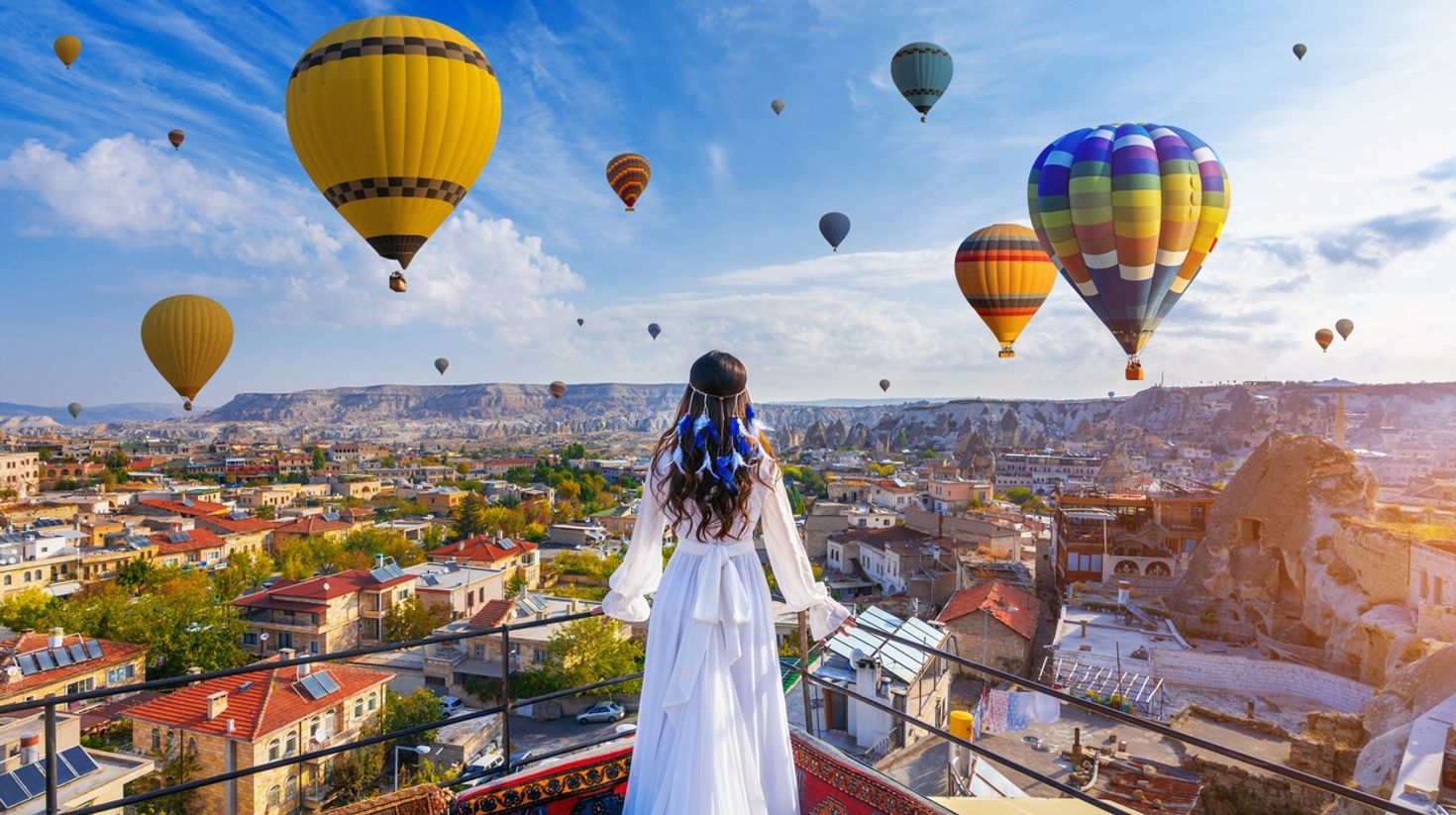 Watch the hot-air balloons rise in the sky in Cappadocia.