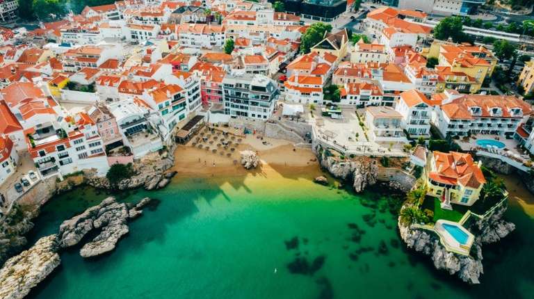 Get this aerial view of Praia da Rainha while spending 5 days in Portugal.
