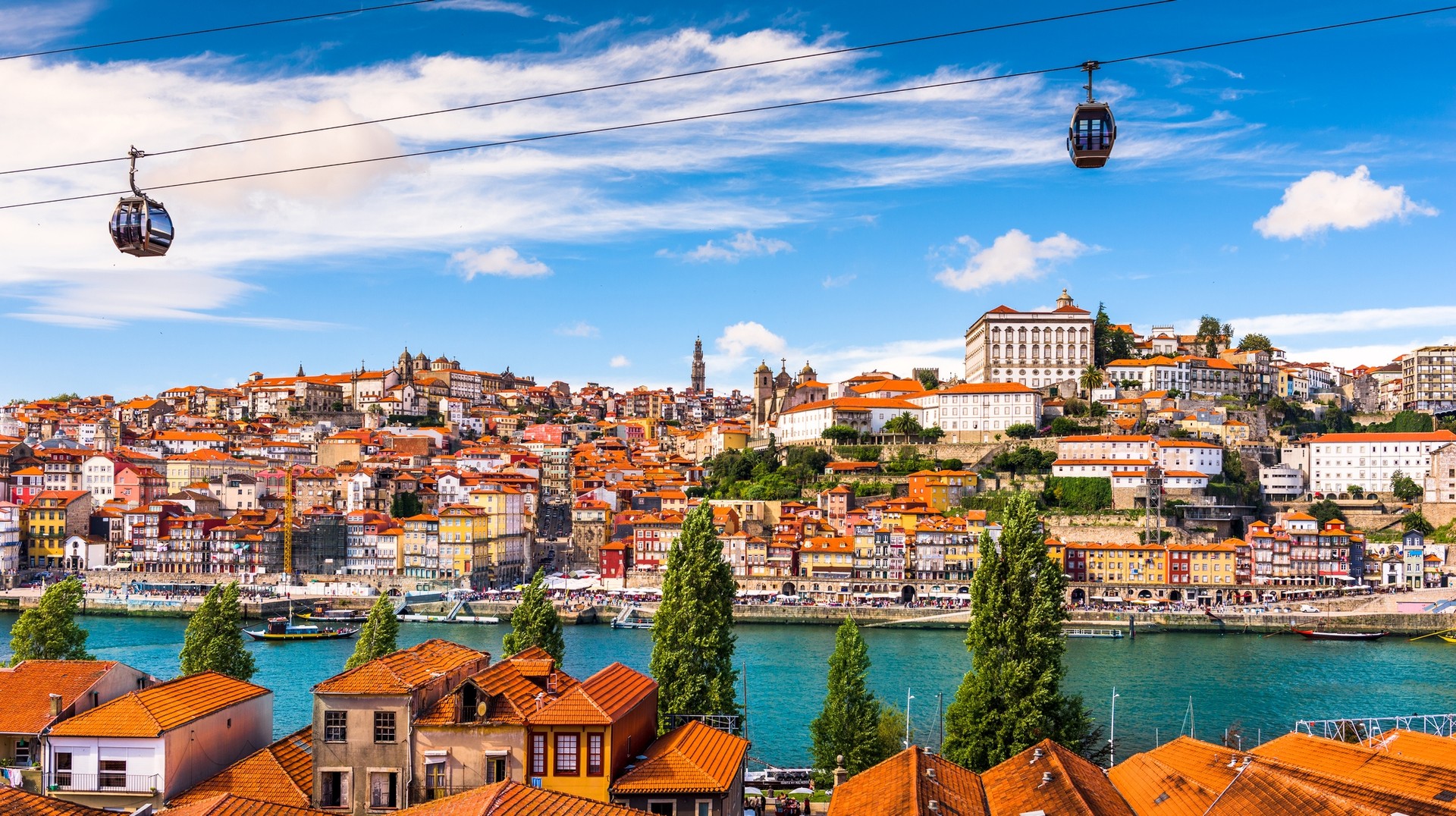 April is the perfect time to witness the colors of Portugal, with many of the cities showcasing the vibrancy of their multicolored architecture. Porto, Portugal cityscape