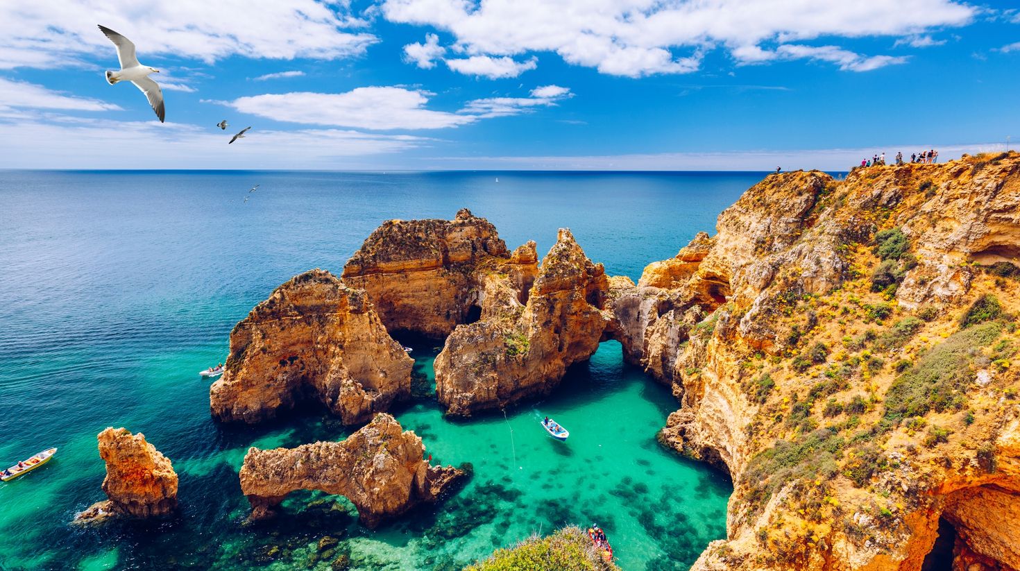 tourist boat on sea at Ponta da Piedade, Algarve region, Portugal