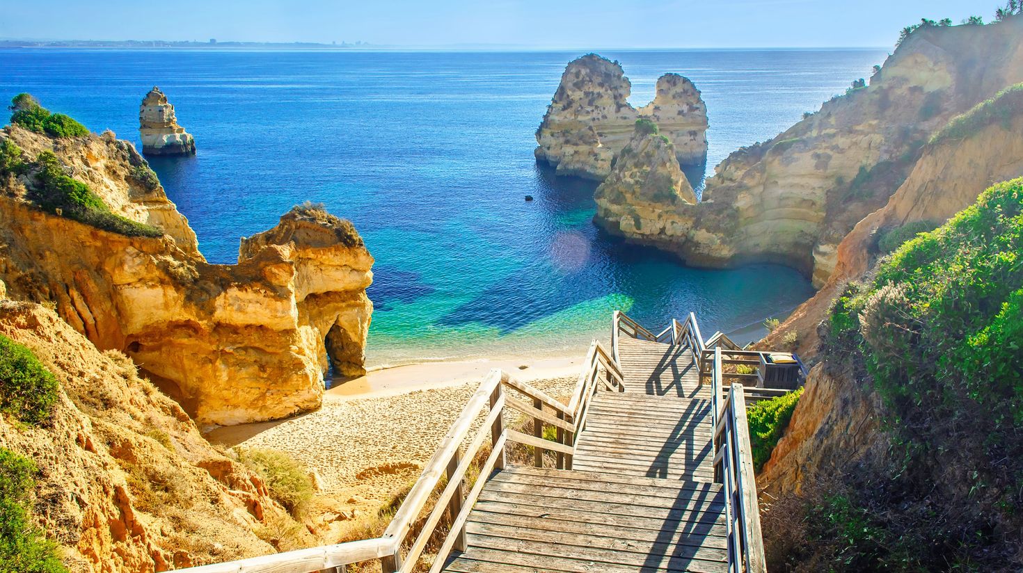 Wooden footbridge to beautiful beach Portugal