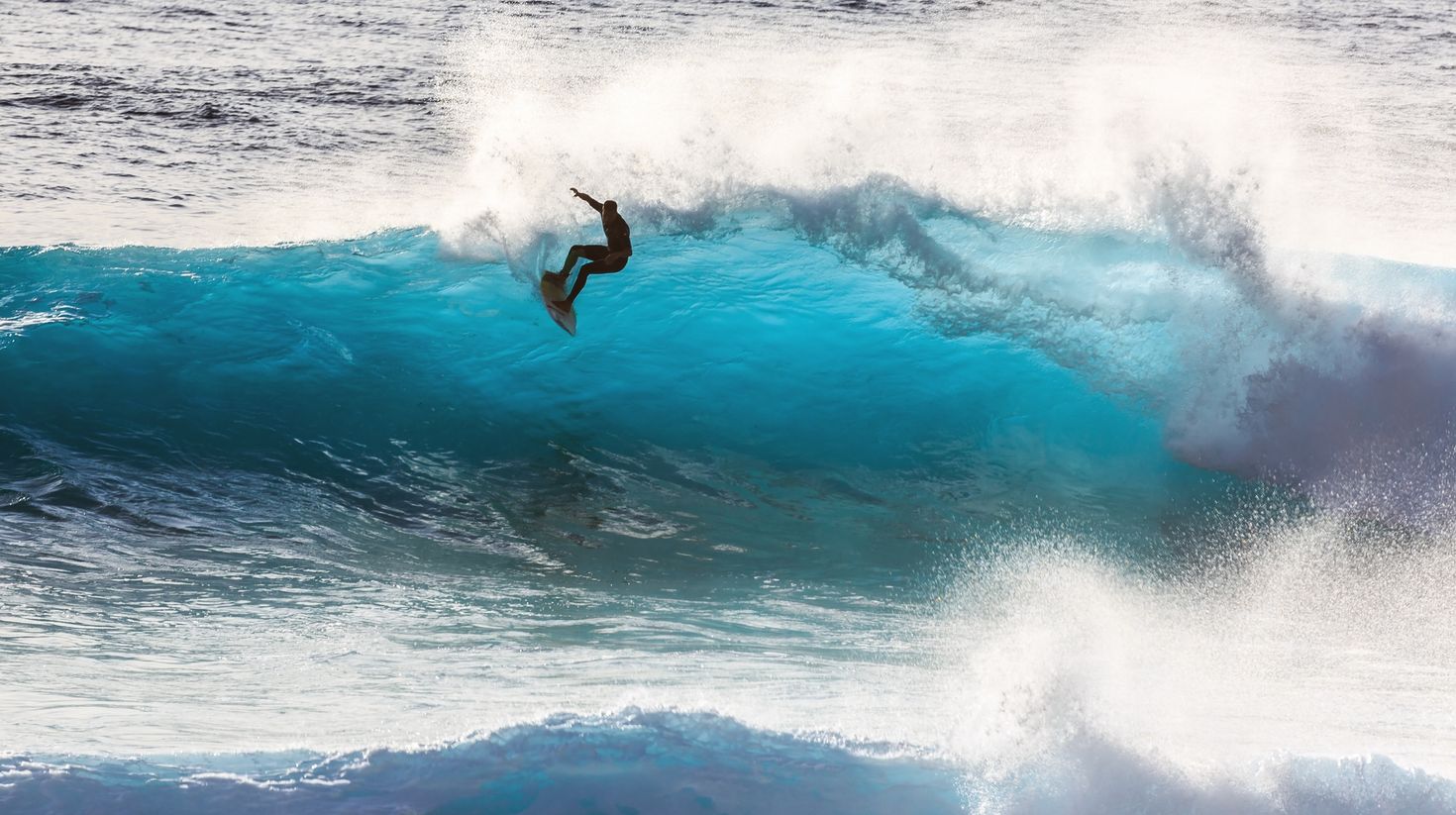 Surf waves on the island Madeira, Portugal, a popular surfing tourist desti