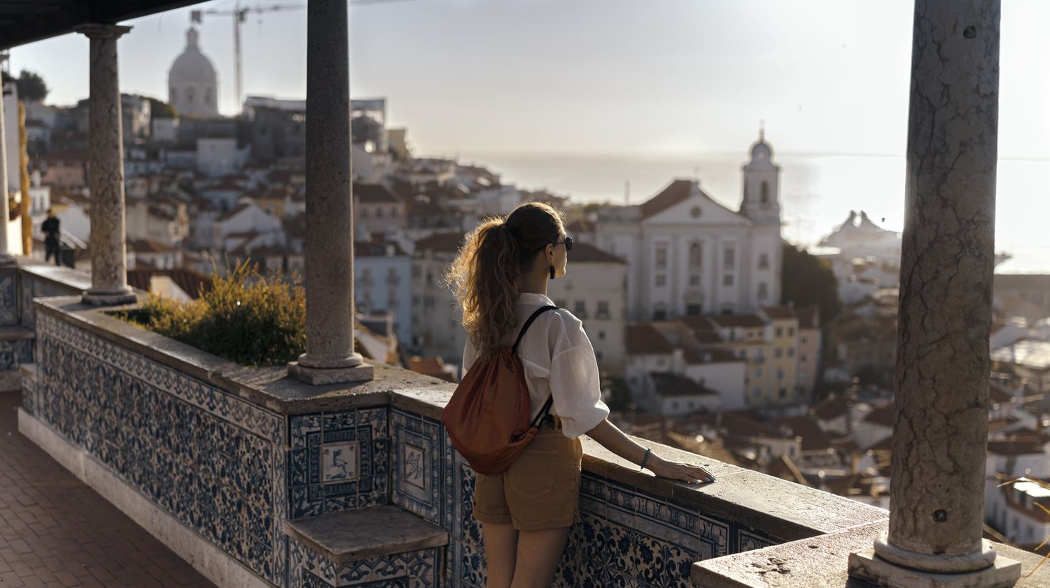 Young women exploring streets of southern Iberic european city