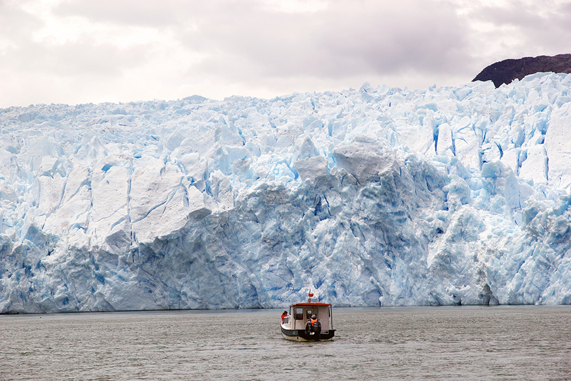 A boat nears the walls of San Rafael Glacier Located in San Rafael Lagoon National Park and spanning a colossal 760km², the San Rafael Glacier is an impressive ice mass.