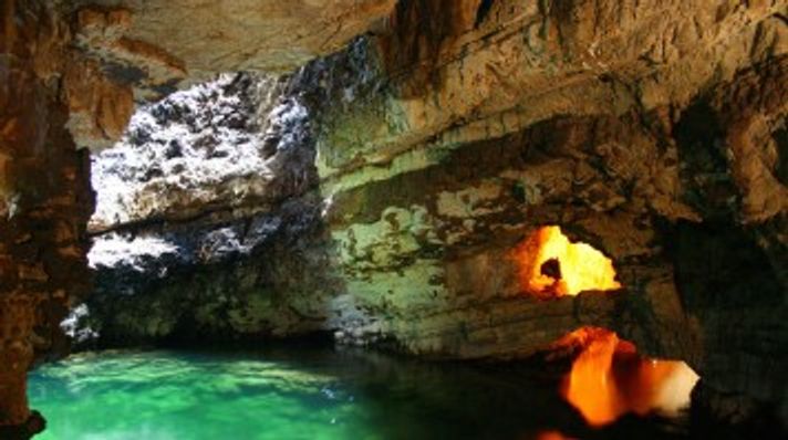 Marvel at the stunning rock formations of Smoo cave