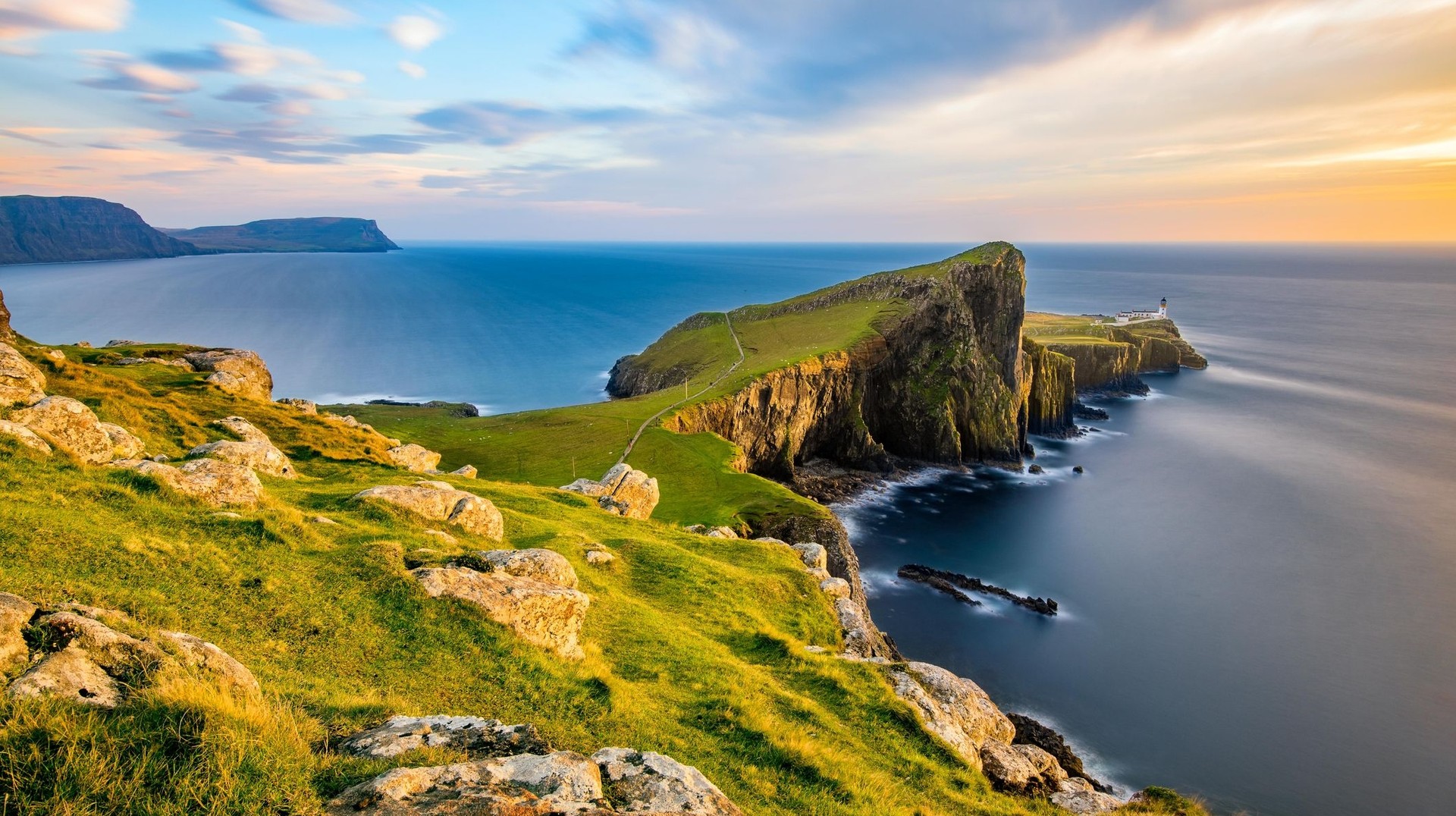 Watch a stunning sunset from the Neist Point during your 4 days in Scotland
