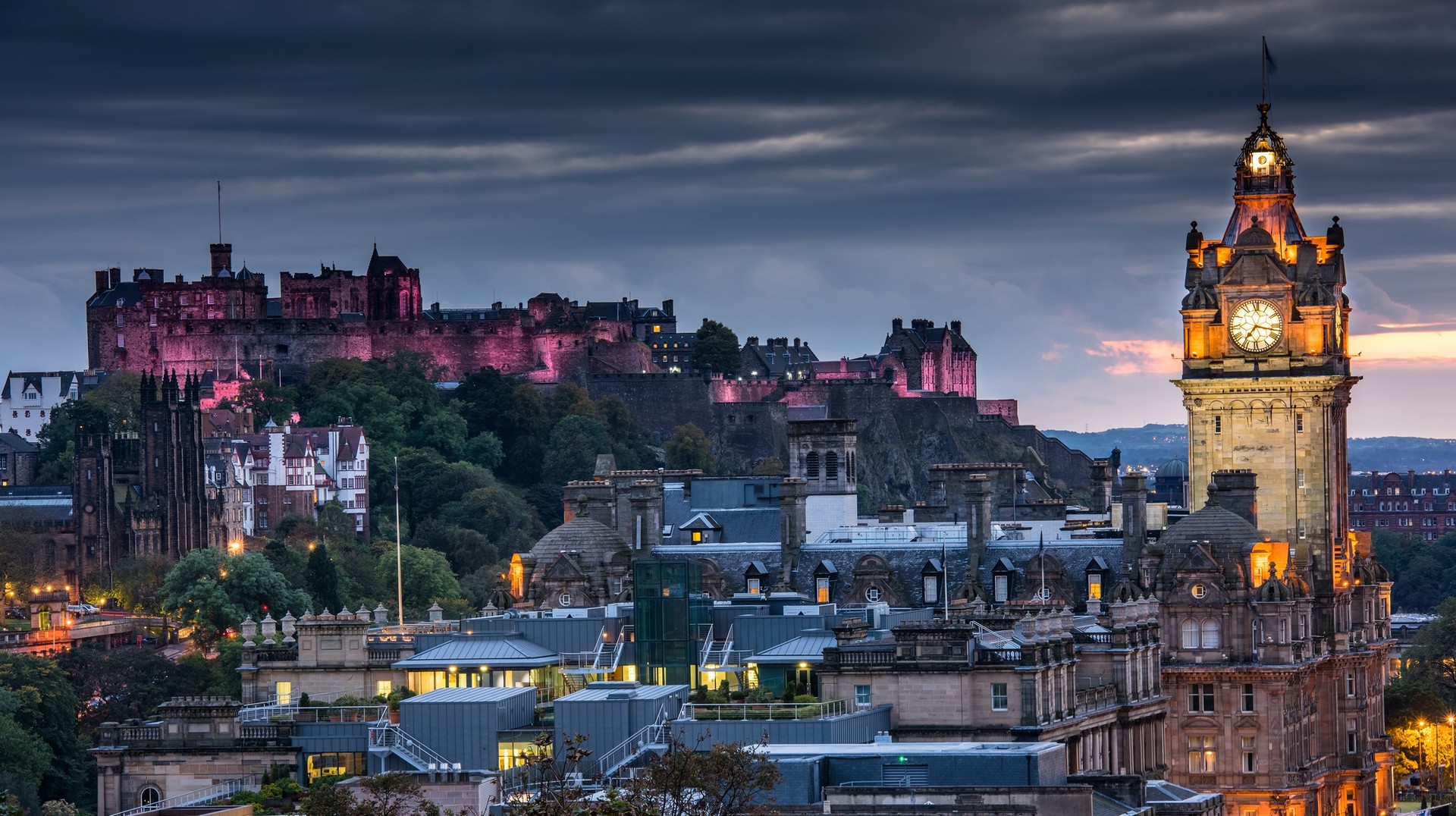 Scotland in May offers a blend of beautiful scenery and historical depth as the country welcomes spring. Edinburgh Castle and cityscape at night in Scotland in May.