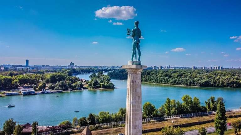 Sweeping view of Kalemegdan with a male statue in Belgrade