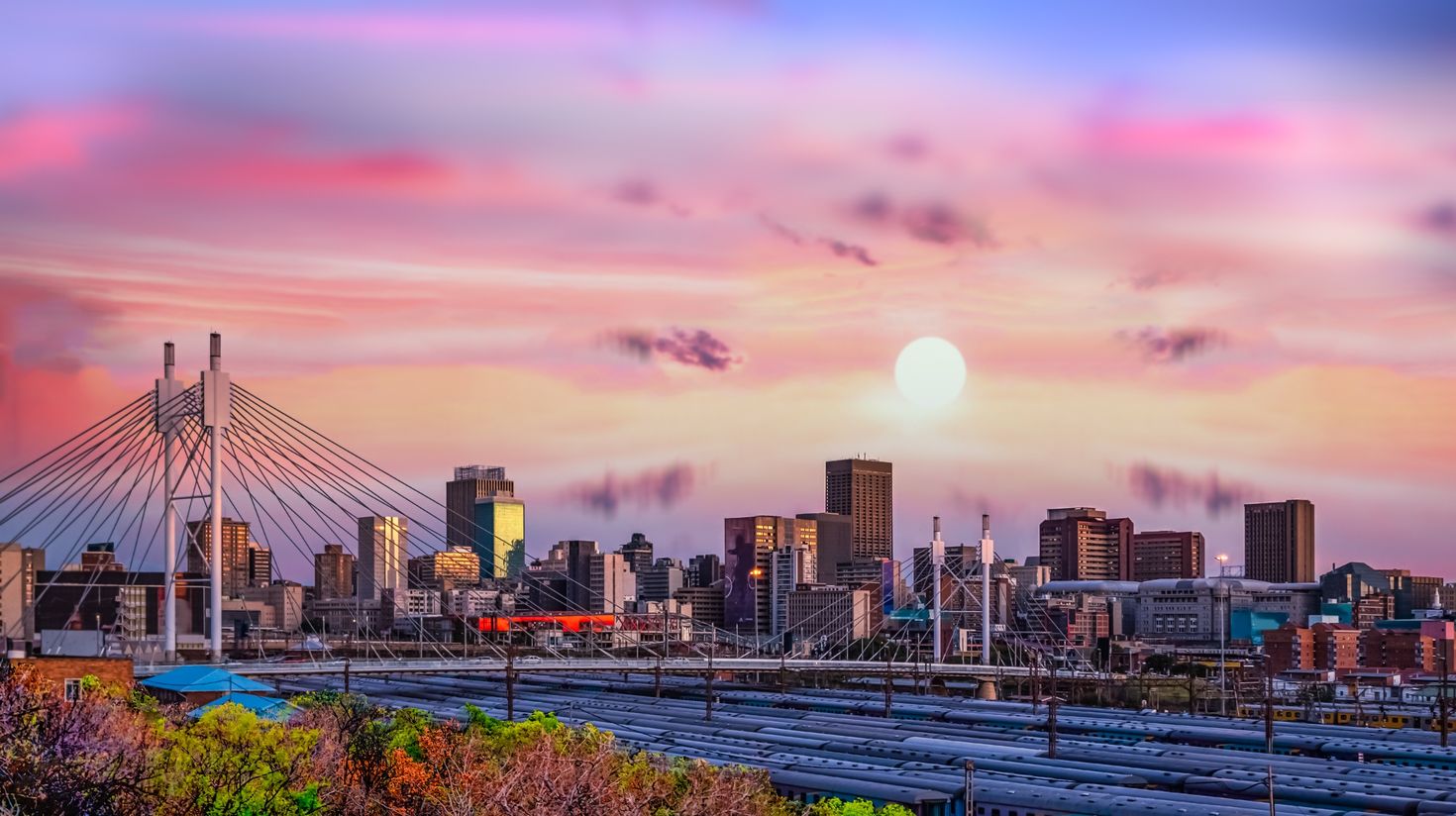 Exposure shot of Johannesburg city skyline and Nelson Mandela bridge.