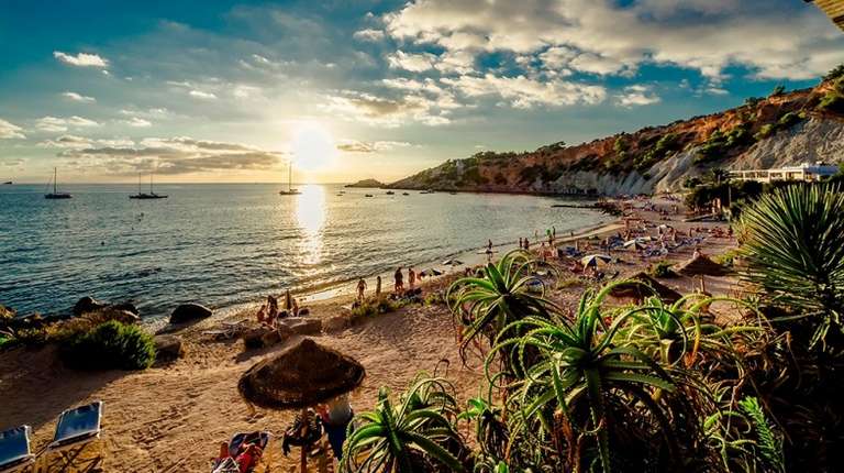 The sun setting down at the beautiful Balearic Islands, a must-see when spending 10 days in Spain.