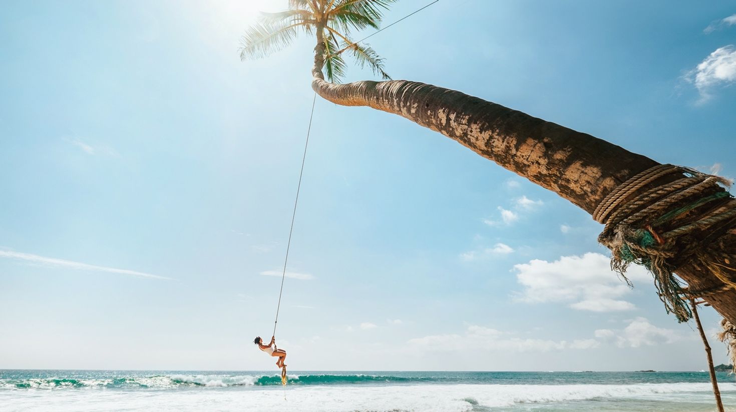 Traveler enjoying the pristine Sri Lanka beach in July
