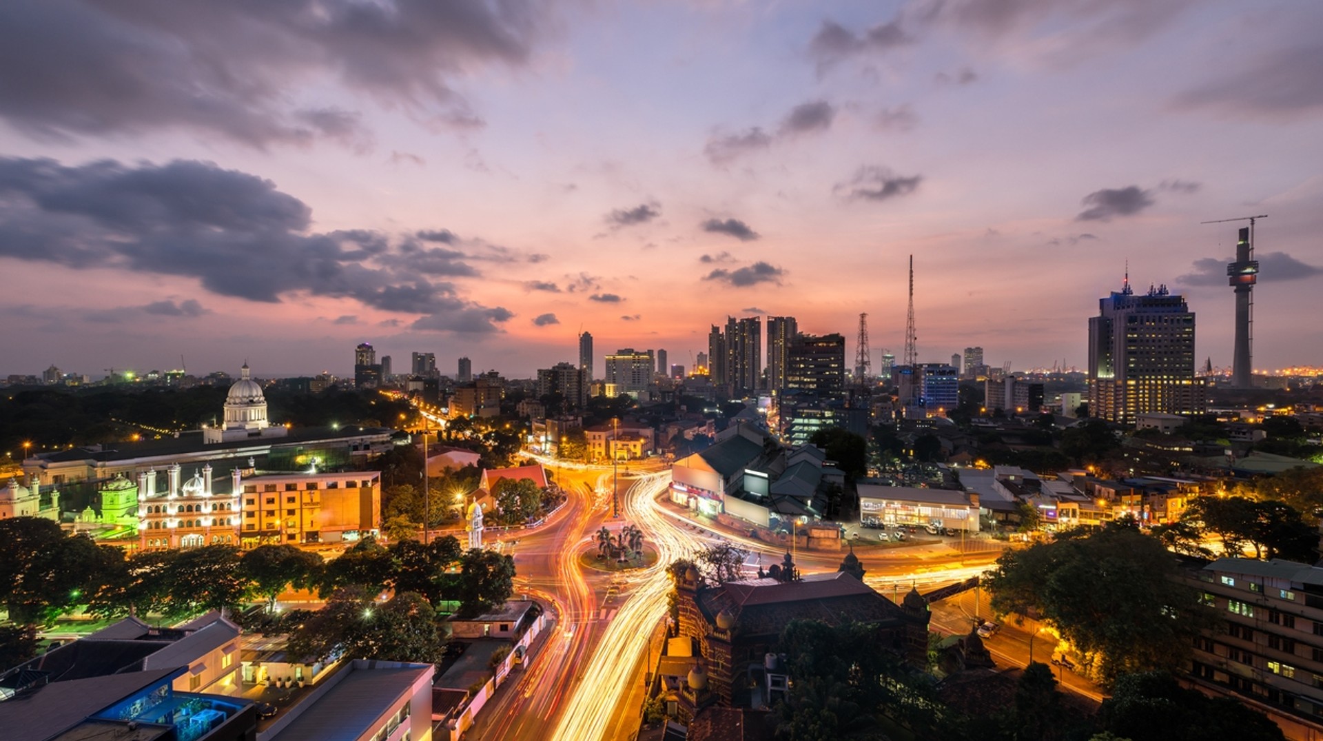 Experience the magnificence of Colombo's rich colonial heritage, featuring a melting pot of races, religions, and cultures. Colombo city at sunset, Sri Lanka in November