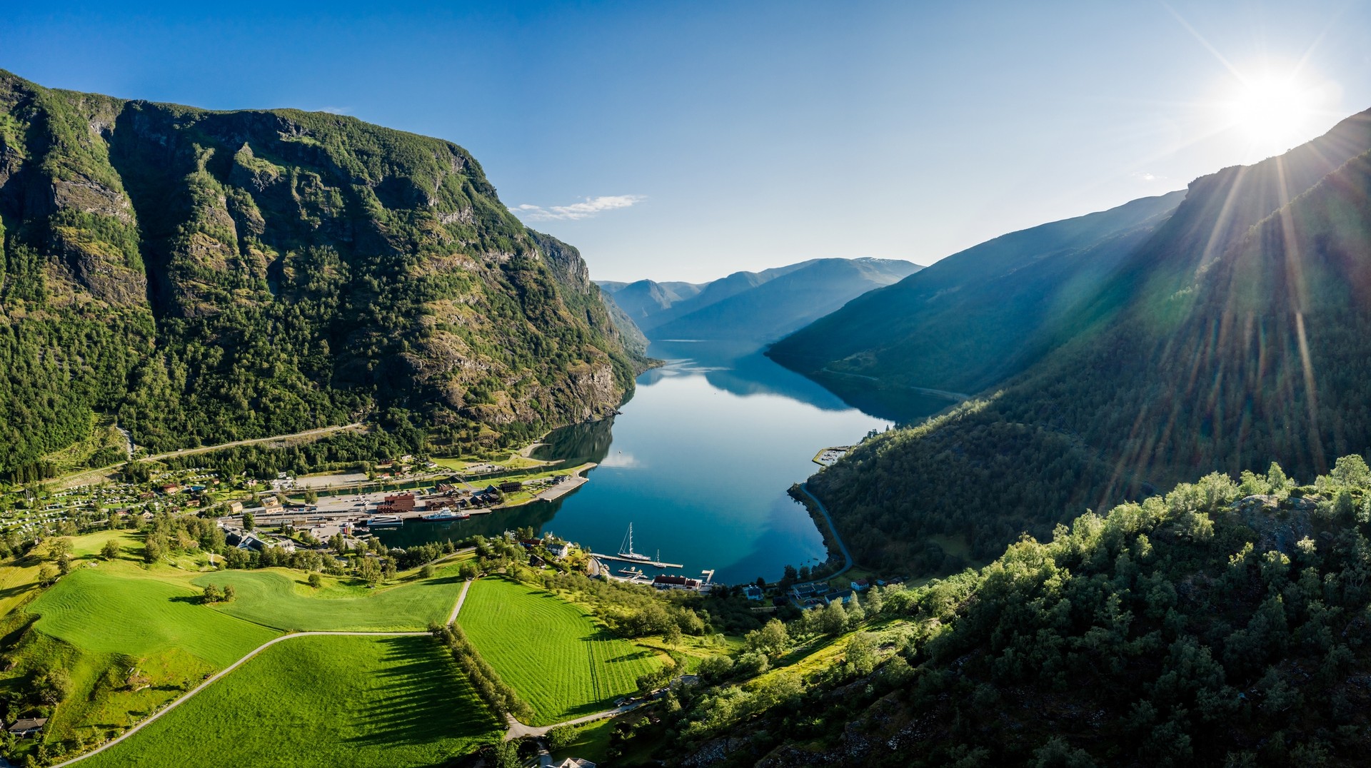 Aurlandsfjord Town of Flam at dawn during summer in Norway.