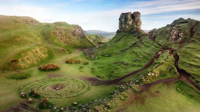 Unique rock formations on an island in Scotland in summer.