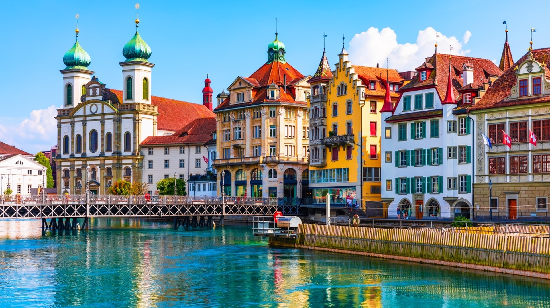 The lake town of Lucerne is mesmerizing in the summer weather in Switzerland in August. Watch this scenic panorama of Lucerne in Switzerland in August.