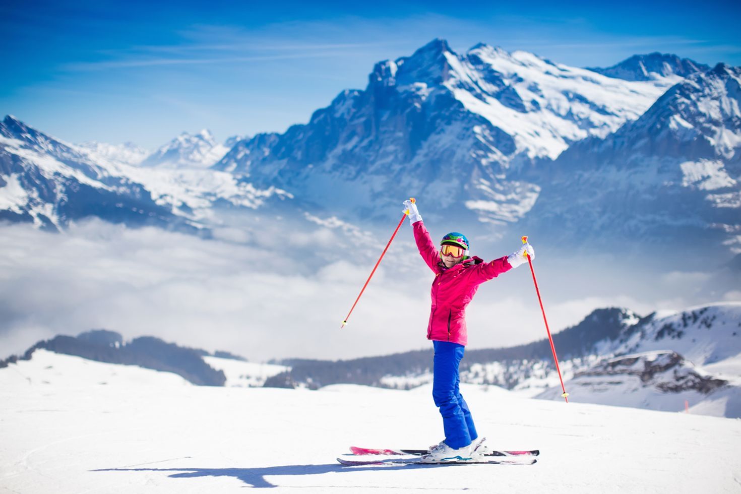 Young woman skiing in the mountains during December in Switzerland