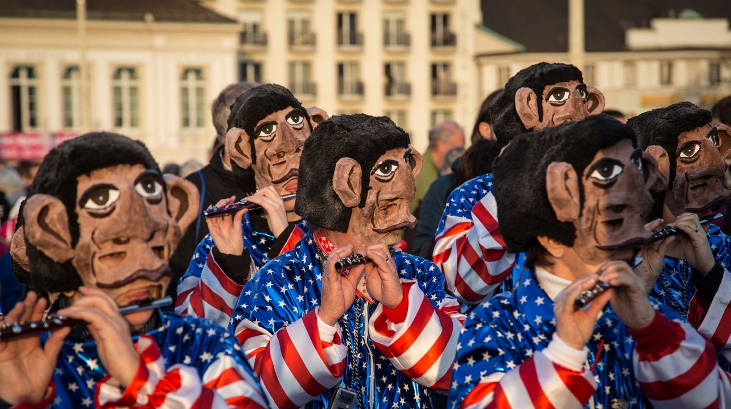 Group of Waggis playing flutes at the Basel carnival in Switzerland.