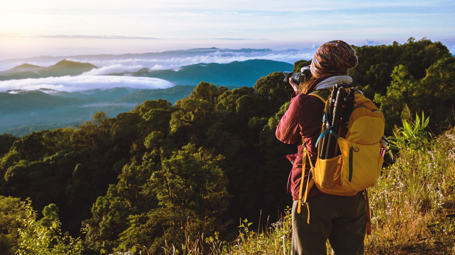 A hiker capturing the beauty of Chiang Mai from the top in Thailand.