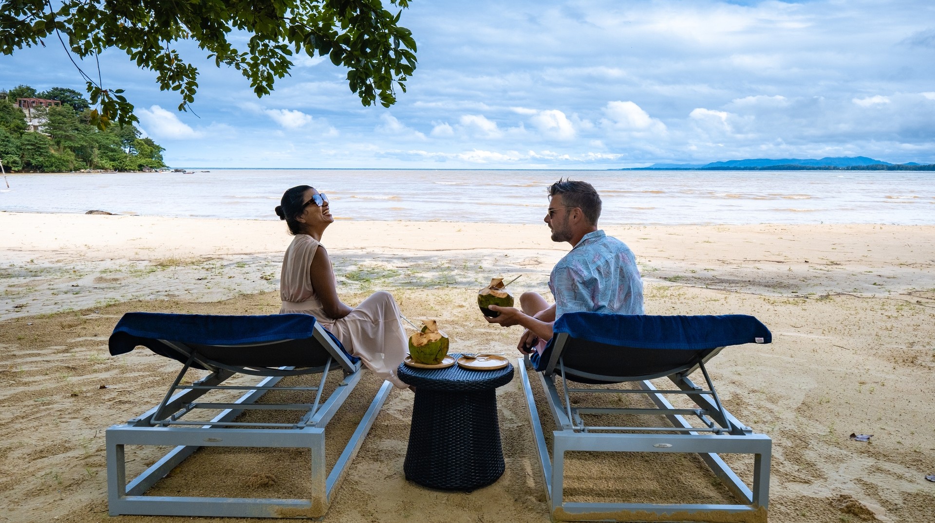 Thailand in June offers the best weather for beach. Tourist couple enjoying on the beach in Phuket in Thailand in June.