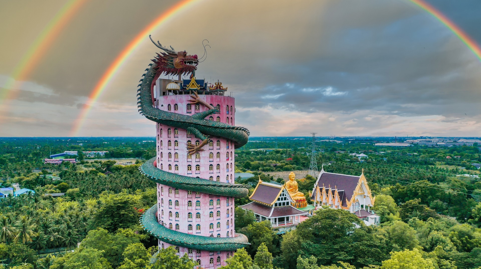 Explore the Dragon temple in Wat Samphran during your trip to Thailand in September. Dragon temple during rainy season in Wat Samphran in Thailand in September.