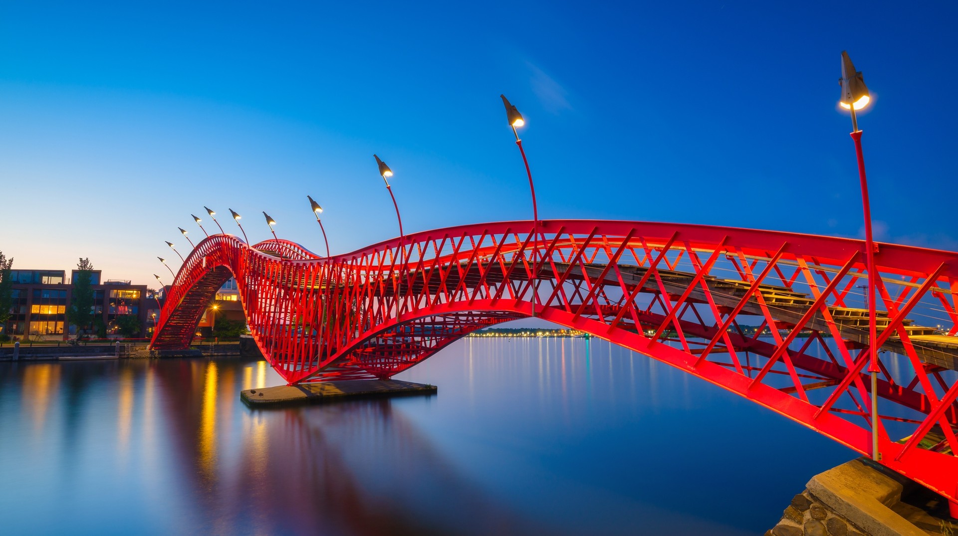 Known for its fascinating design, the Python Bridge is a must-see while visiting the Netherlands in March. The Python Bridge during the blue hour in the Netherlands in March.