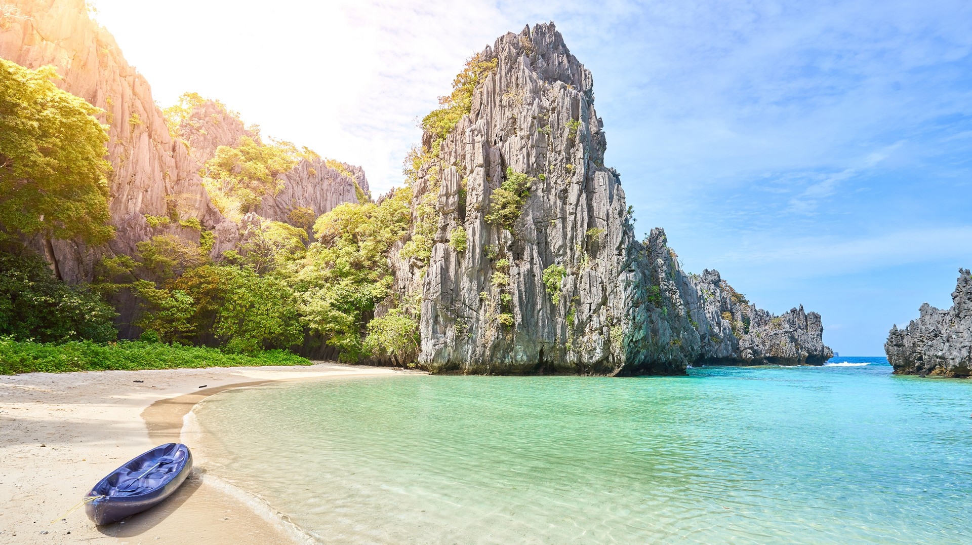 Dive into the warmth in the Philippines during March, where the sun-kissed beaches beckon with their golden sands and crystal-clear waters. Breathtaking bay with turquoise water in EL Nido, a hidden beach in Palawan in the Philippines in March.