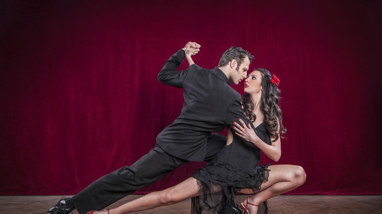 A young couple performing tango dance in Argentina.