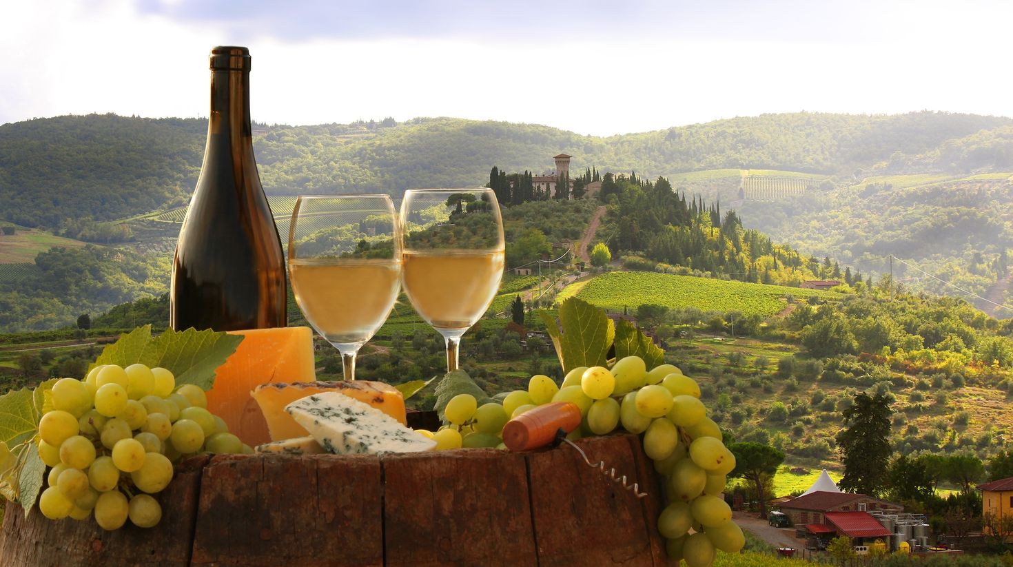 Eating local Italian pasta and drinking red wine under the setting sun of tuscany is one of the top things to do in Italy.