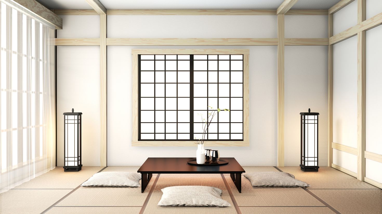 Ryokan living room with tatami mat floor and decoration.