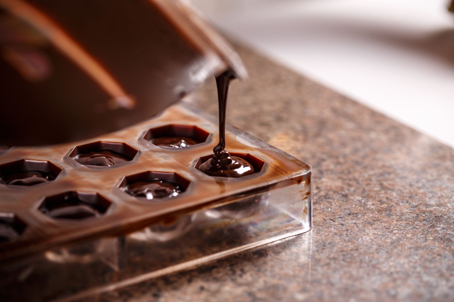 Making chocolate molds is a fun thing to do in Ubud for the entire family