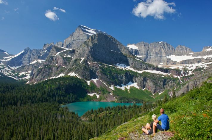 Hikers enjoy the view of Glacier National Park in Northern Montana